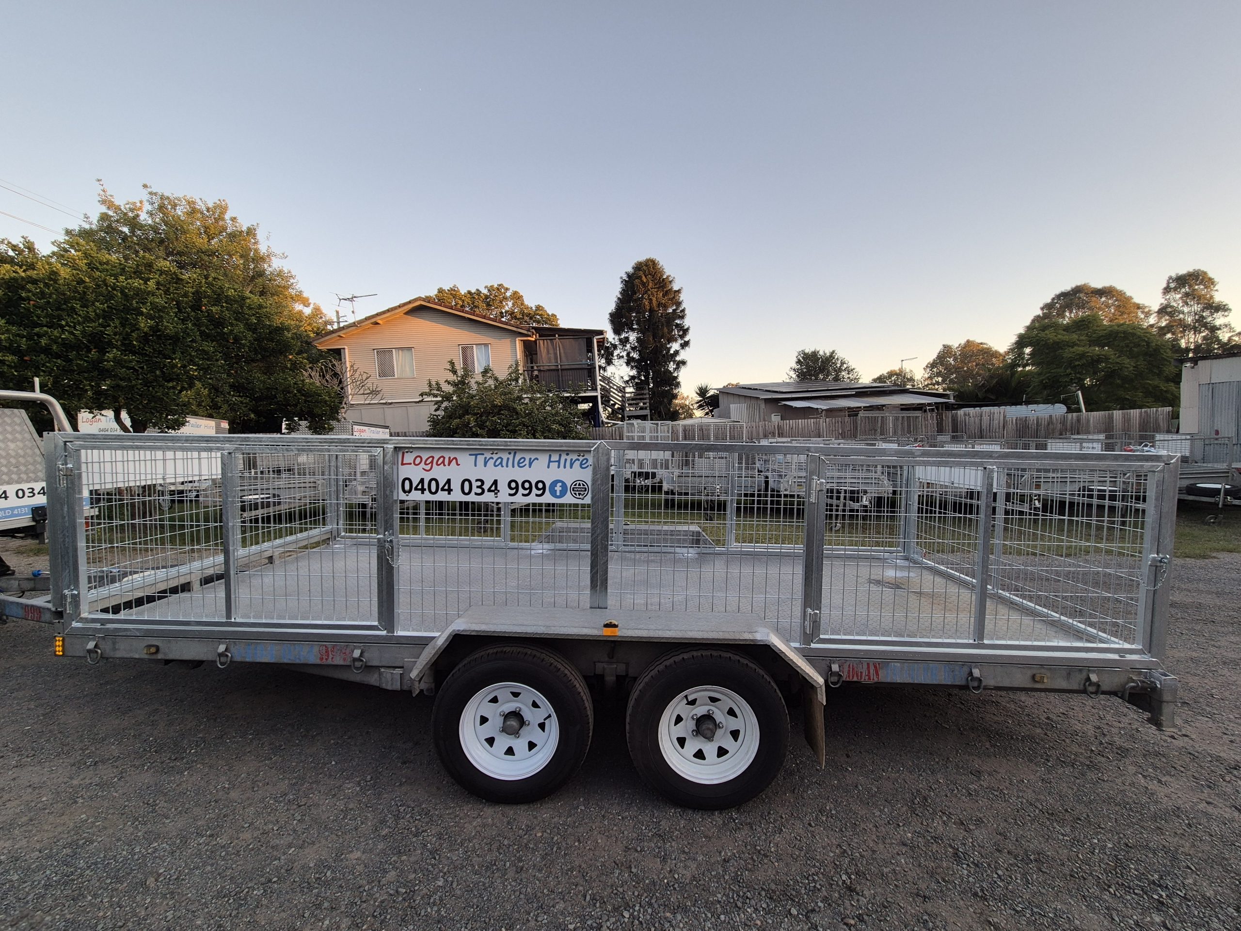 Large tandem cage trailer hire Logan and Brisbane – heavy-duty galvanised cage trailer side view